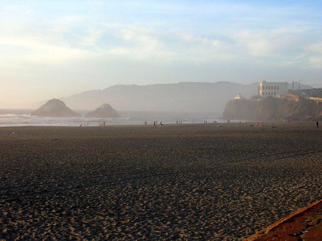 view of the Cliff House from the Ocean Beach esplanade